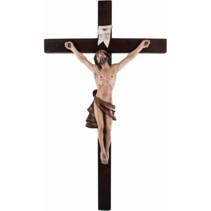 Viktor-Art El Crucifijo - Jesucristo Crucificado es una escultura de madera de Jesús clavado en una cruz oscura, vestido con un paño, con la cabeza inclinada y los ojos cerrados. Encima figura la inscripción INRI. Presentado sobre fondo blanco, es un regalo único. Talla exclusiva en madera