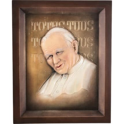 Viktor-Art A unique gift, Papież - Jan Paweł II - Totus Tuus is a framed 3D relief portraying the Pope in white robes, with the Latin phrase TOTUS TUUS on a bronze background, all set in a dark brown wood frame. Exclusive Woodcarving